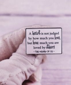 Alternative view of Wizard of Oz 'A Heart is Not Judged' Enamel Pin