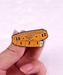 Alternative view of Measuring Tape 'Practically Perfect Everyway' Enamel Pin