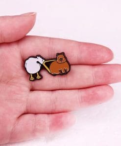 Alternative view of Playful Animal 'Pelican Bites Capybara' Enamel Pin