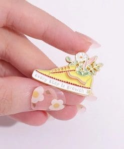 Alternative view of Yellow Sneaker 'Every Step is A Growth' Enamel Pin