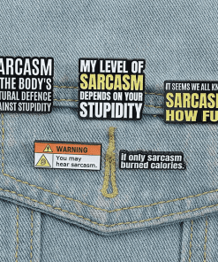 Alternative view of Sarcasm Quotes 'the Body's Natural Defense Against Stupidity' Enamel Pin