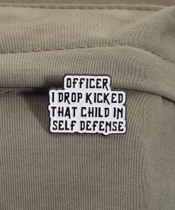 Humorous Quote 'Officer I Drop Kicked That Child In Self Defense' Enamel Pin - Image 3